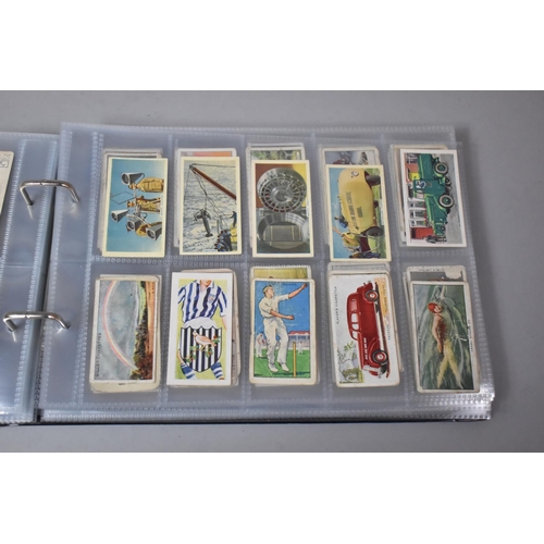 262 - A Ring Binder Containing Part Sets of Cigarette Cards etc