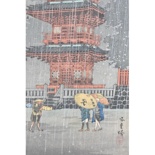 329 - A Framed Oriental Print Depicting Pagoda in Rain Storm, 37x16cm