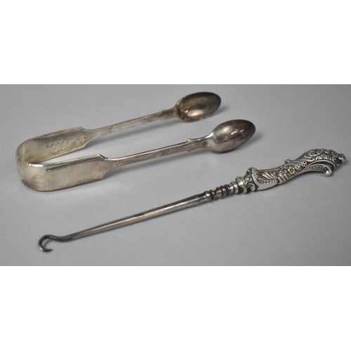 413 - A Victorian Silver Sugar Bow and a Silver Handled Button Hook