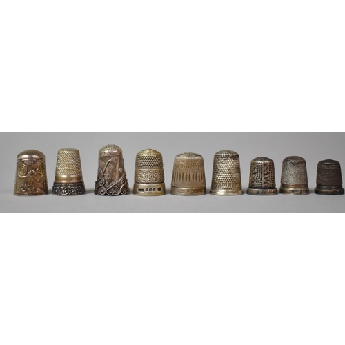 417 - A Collection of Nine Various Silver Thimbles