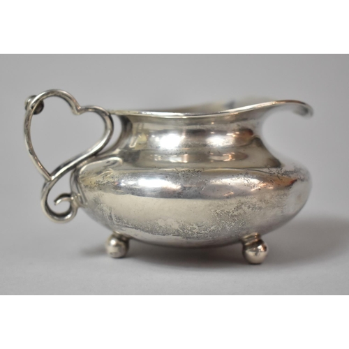 421 - A Silver Cream Jug, Sheffield Hallmark, 116.8g