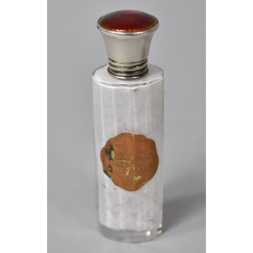 425 - A Collection of Three Silver Topped Glass Scent Bottles, One with Enamelled Top