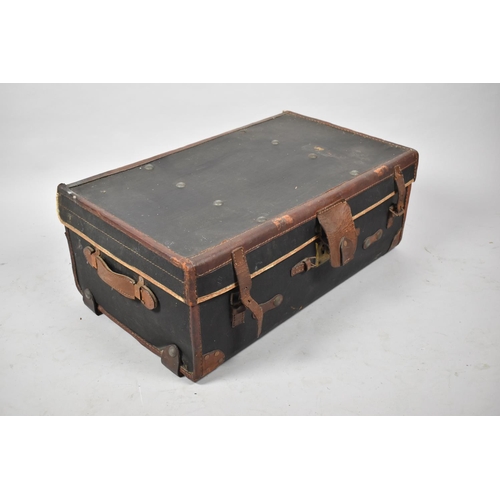 473 - A Leather Mounted Canvas Travelling Trunk, 76cm wide