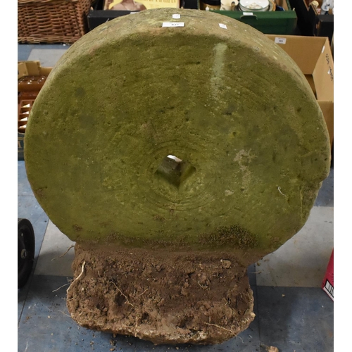 475 - A 19th Century Hand Cut Sandstone Grindstone Set in Concrete Plinth, 64cm Diameter