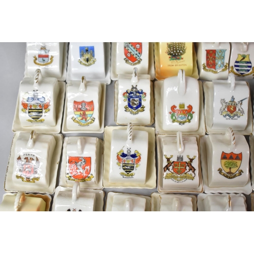 478 - A Large Collection of Crested Ware Cheese Dishes