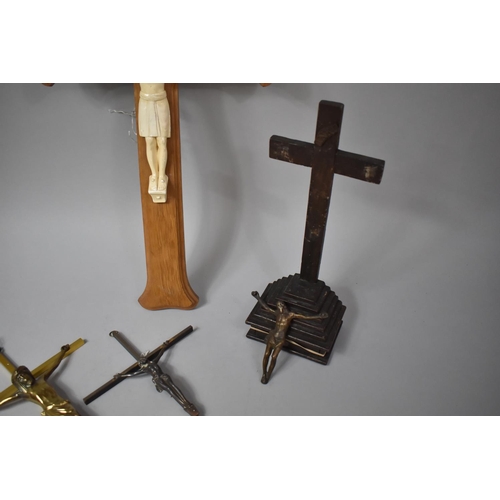 509 - Four 20th Century Crucifix, Tallest 56cm high