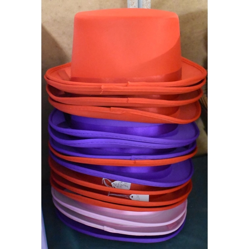 517 - A Collection of Fourteen Coloured Party Top Hats