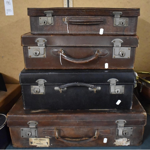 521 - A Collection of Four Vintage Leather Suitcases