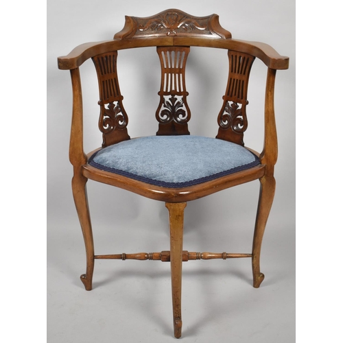 542 - A Late 19th/Early 20th Century Corner Armchair with Pierced Splats and Carved Top Rail