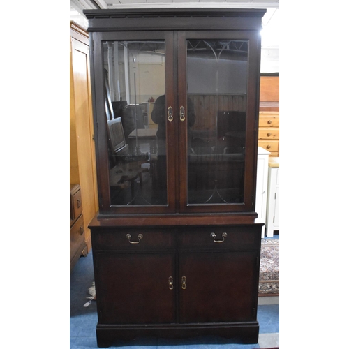 558 - A Modern Mahogany Display Cabinet with Two Centre Drawers Over Cupboard Base and Glazed Top Section ... 