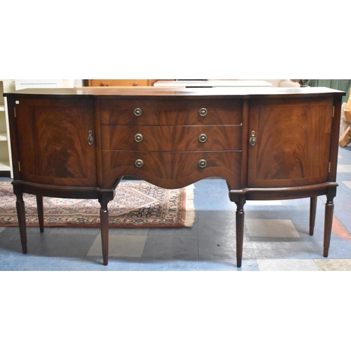 561 - A Mahogany Sideboard with Three Centre Drawers Flanked by Cupboards and Crossbanded Top, 170cm Long