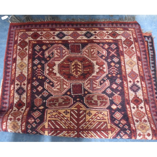 564 - A Patterned Woollen Rug, 170x100cm