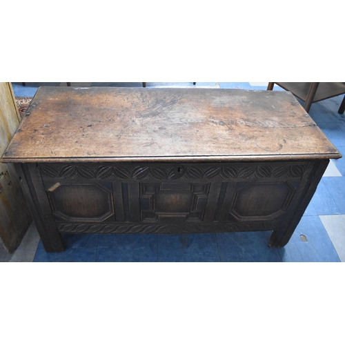 566 - A 19th Century Oak Lift Top Three Panel Coffee Chest, Later Carving, 125cm wide