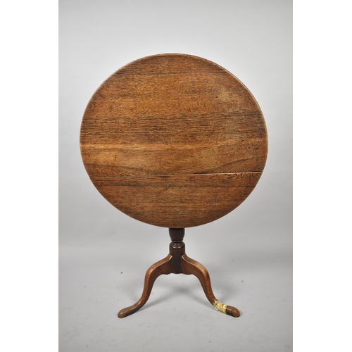 578 - A 19th Century Snap Top Oak Tripod Table, One Foot Repaired, 75cm Diameter