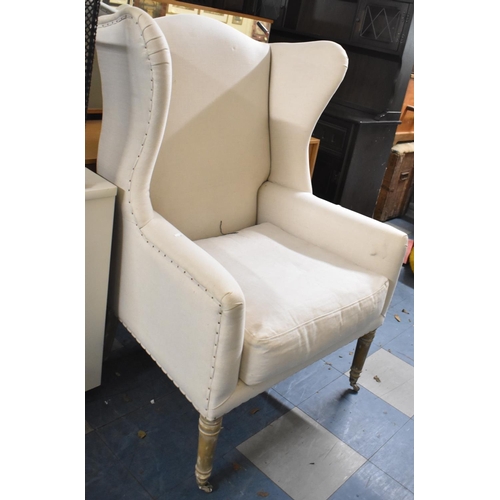 582 - A Modern Wing Armchair