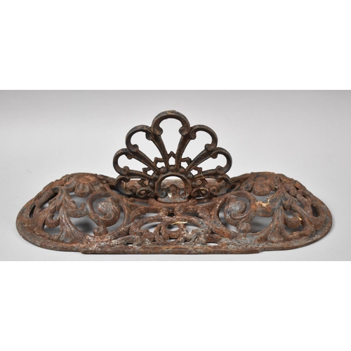 91 - A Mid/Late 19th Century Pierced Cast Iron Stove Top with Fan Handle, 37cm wide