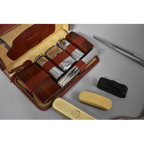 239 - A Vintage Leather Cased Travelling Set, Glove Stretcher, Brushes and Dressing Table Mirror Frame, Po... 