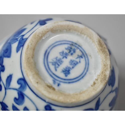 253 - A Chinese Blue and White Bowl Having Floral Decoration, Six Character Mark to Base Inside Double Con... 