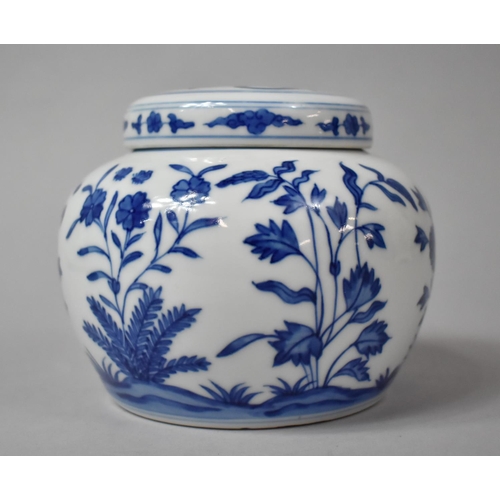 259 - A Chinese Blue and White Lidded Pot of Squat Form with Floral Decoration, Six Character Mark to Base... 