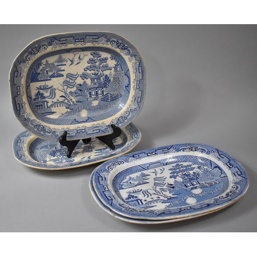 284 - A Collection of Four 19th Century Blue and White Willow Pattern Meat Plates (Varying Condition Issue... 