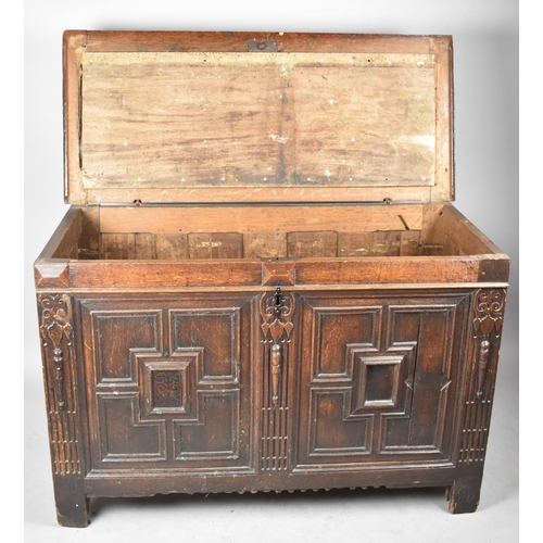 574 - A Large 19th Century Carved Oak Mule Chest with Geometric Decorated Panels to Front, Some Losses