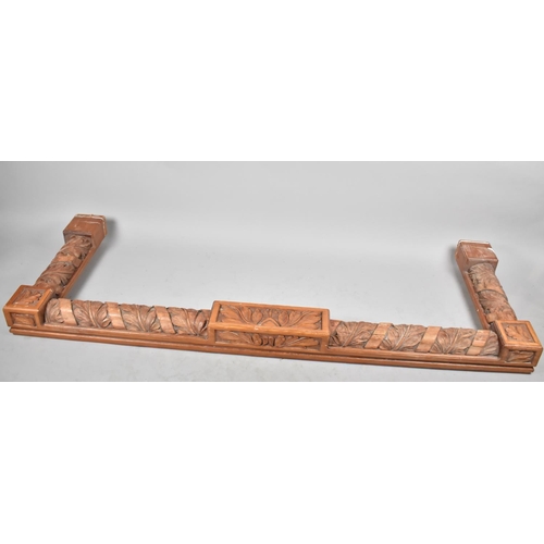 578 - A Carved Wooden Fire Kerb Decorated with Oak Leaves, 194cm wide