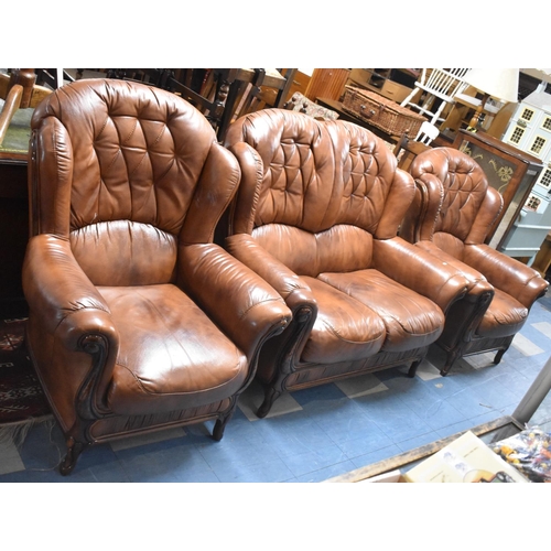 579 - A Modern Leather Effect Three Piece Suite with Two Seater Settee