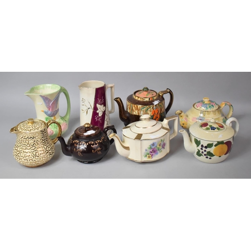 584 - A Collection of Various 20th Century Teapots, Jugs Etc