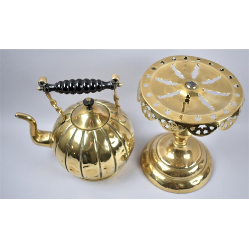 86 - A Victorian Brass Circular Topped Pierced Trivet, Together with a Brass Kettle