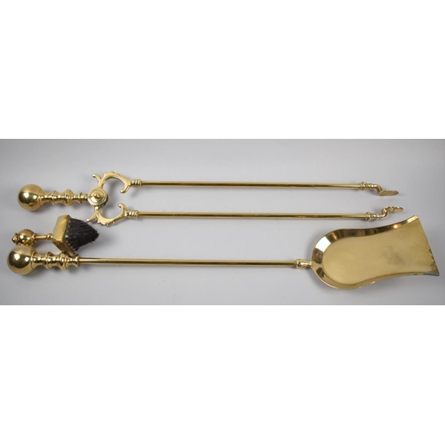 87 - Two Long Handled 19th Century Brass Fire Irons and a Small Brush, 70cm Long