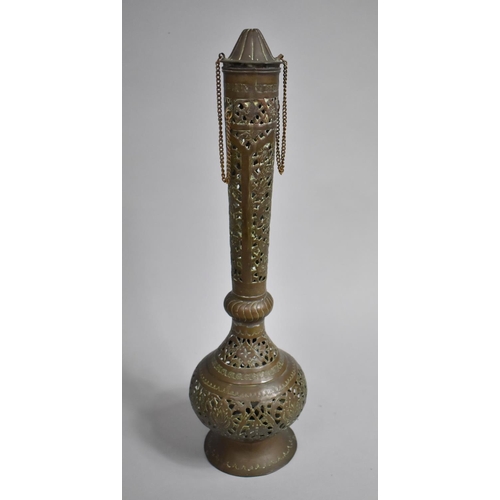 113 - An Islamic Water Ewer with Pierced and Floral Decoration, 47.5cms High