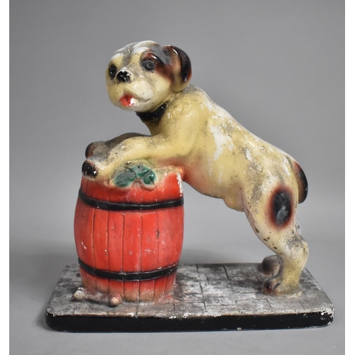 134 - A Vintage Chalkware Study of Dog Leaning on Barrel, 23cms High, Condition Issues to Include Loss to ... 