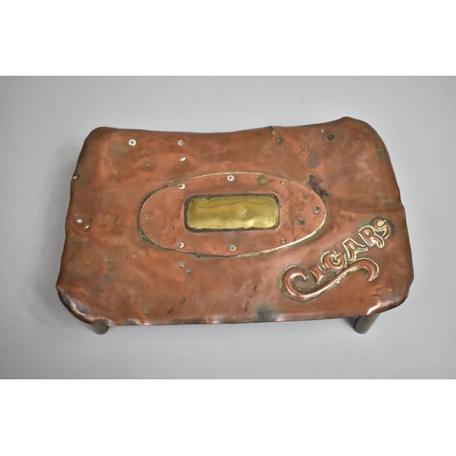 26 - An Arts and Crafts Copper and Brass Cigar Box with Embossed and Studded Decoration, 26.5cms Wide by ... 