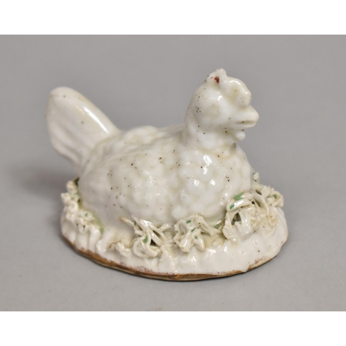 574 - A 19th Century Small Staffordshire White Glazed Hen Set on Naturalist Base