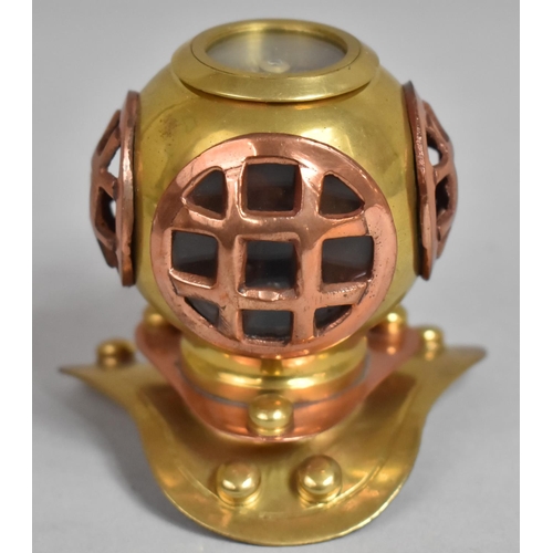 65 - A Novelty Brass and Copper Desk Top Compass in the Form of a Divers Helmet, 8.5cms High