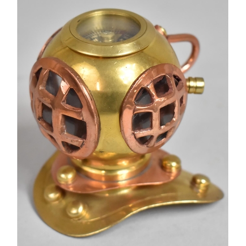 65 - A Novelty Brass and Copper Desk Top Compass in the Form of a Divers Helmet, 8.5cms High