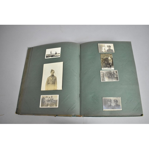 69 - An Edwardian Postcard Album to include Collection of Military Royal Fusiliers, WWI Etc together with... 