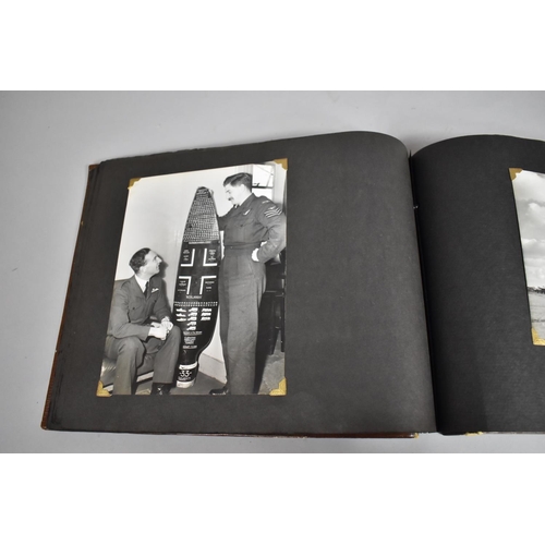 70 - A Vintage Album Containing 85 Monochromatic Photographs to include Royal Canada Air Force, Jersey Ro... 