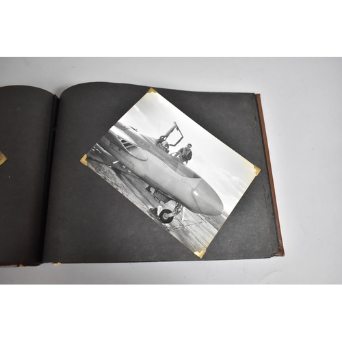 70 - A Vintage Album Containing 85 Monochromatic Photographs to include Royal Canada Air Force, Jersey Ro... 