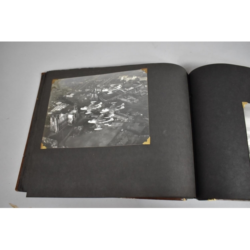 70 - A Vintage Album Containing 85 Monochromatic Photographs to include Royal Canada Air Force, Jersey Ro... 