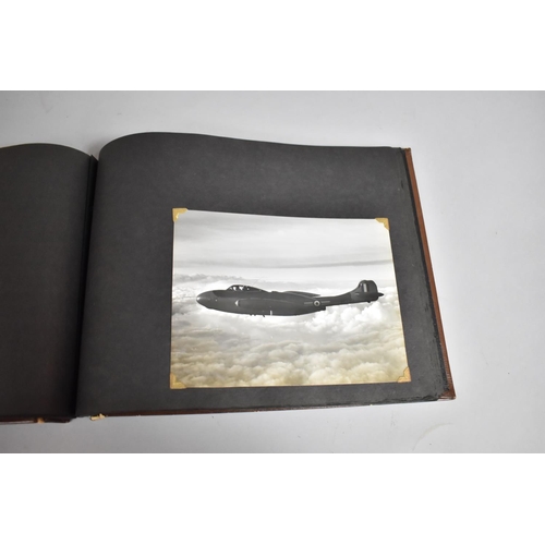 70 - A Vintage Album Containing 85 Monochromatic Photographs to include Royal Canada Air Force, Jersey Ro... 