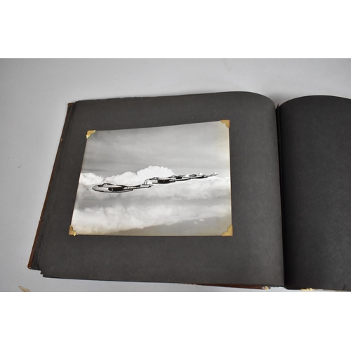 70 - A Vintage Album Containing 85 Monochromatic Photographs to include Royal Canada Air Force, Jersey Ro... 