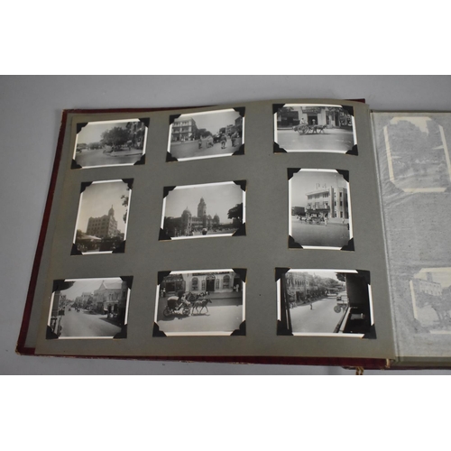 80 - A Vintage Album Containing 80 Monochromatic Photographs including Military Campaigns, Travel, Ships,... 