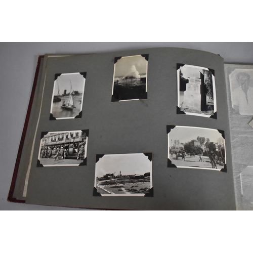 80 - A Vintage Album Containing 80 Monochromatic Photographs including Military Campaigns, Travel, Ships,... 