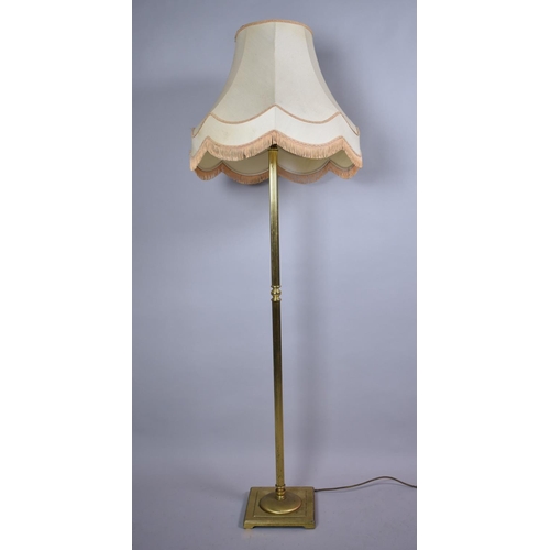 506 - A Mid 20th Century Ribbed Brass Standard Lamp and Shade