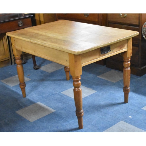 515 - A Stripped Pine Kitchen Table on Turned Support with Single Drawer, 114cm x 78cm