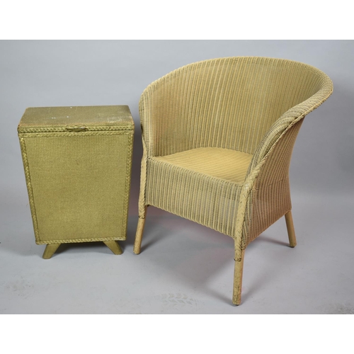 529 - A Lloyd Loom Armchair and Loom Style Linen Box