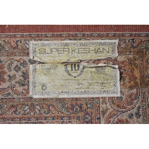 540 - A Woollen Super Keshan Patterned Rug, 198x140cm