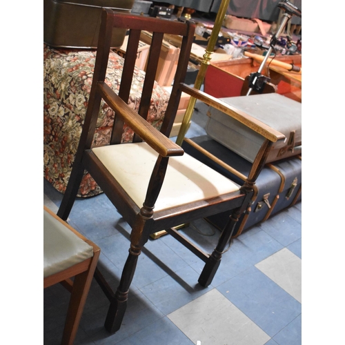 548 - An Edwardian Oak Framed Armchair