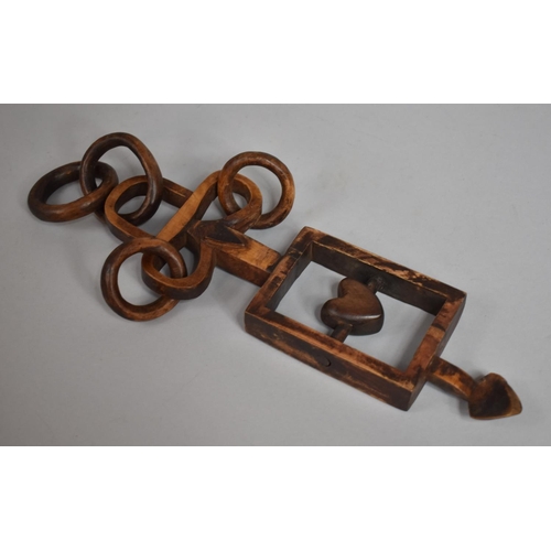 28 - An Antique Birch Wood Welsh Love Spoon with Carved Chain Links and an Open Frame with a Pierced Hear... 